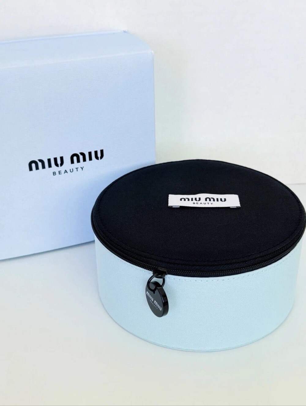 Miu Miu Light Blue and Black Round Cosmetic Case NEW AUTHENTIC